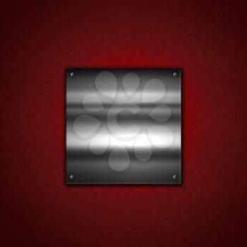 Grunge Metal background with a shiny metallic plate on a red leather texture