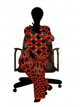 Royalty Free Photo of a Woman in Pyjamas Sitting in a Chair