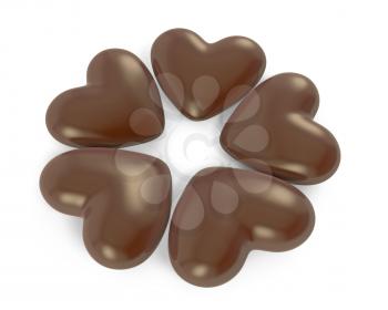 Five heart shaped chocolate candies, isolated on white background