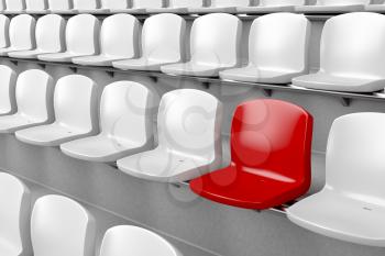 Unique red seat among white ones