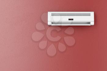 Split-system air conditioner on red wall 
