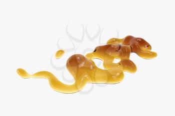 Golden honey drop on white background, 3d rendering. Computer digital drawing.