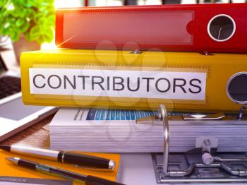 Yellow Ring Binder with Inscription Contributors on Background of Working Table with Office Supplies and Laptop. Contributors Business Concept on Blurred Background. 3D Render.