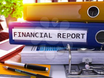 Financial Report - Blue Ring Binder on Office Desktop with Office Supplies and Modern Laptop. Financial Report Business Concept on Blurred Background. 3D Render.