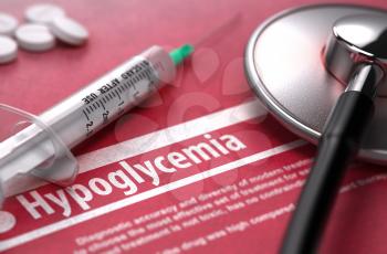 Hypoglycemia - Medical Concept on Red Background with Blurred Text and Composition of Pills, Syringe and Stethoscope. 3D Render.