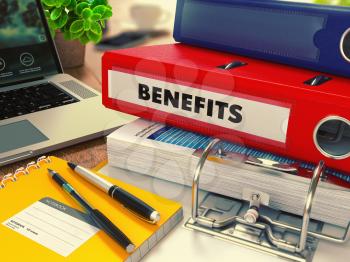 Red Office Folder with Inscription Benefits on Office Desktop with Office Supplies and Modern Laptop. Business Concept on Blurred Background. Toned Image. 3d Render.