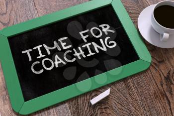 Handwritten Time for Coaching on a Green Chalkboard. Top View Composition with Chalkboard and White Cup of Coffee. 3D Render.