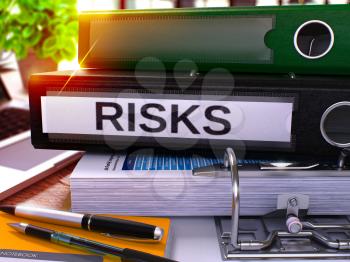 Risks - Black Ring Binder on Office Desktop with Office Supplies and Modern Laptop. Risks Business Concept on Blurred Background. Risks - Toned Illustration. 3D Render.