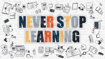 Never Stop Learning. Never Stop Learning Drawn on White Brick Wall. Never Stop Learning in Multicolor. Modern Style Illustration. Doodle Design Style of Never Stop Learning. Line Style Illustration. 