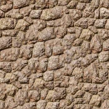 Natural Brown Rock Stone Wall Texture. Texture of a Medieval Castle Wall. Seamless Tileable Texture.