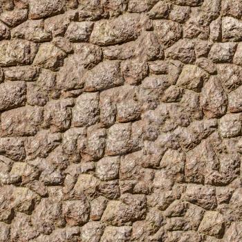 Natural Brown Rock Stone Wall Texture. Texture of a Medieval Castle Wall. Seamless Tileable Texture.