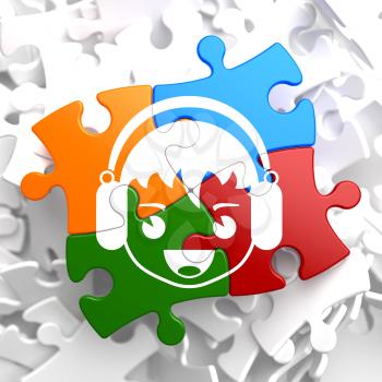 Happy Boy with Headphones Icon on Multicolor Puzzle. Sound, Music Concept.