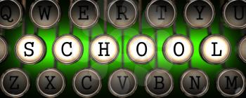 School on Old Typewriter's Keys on Blue Background.