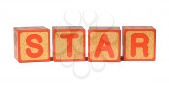 Star on Wooden Childrens Alphabet Block Isolated on White.