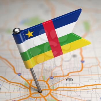 Small Flag of Central African Republic on a Map Background with Selective Focus.