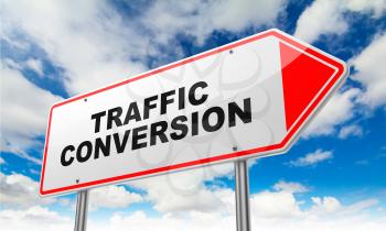 Traffic Conversion - Inscription on Red Road Sign on Sky Background.