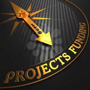 Projects Funding  - Golden Compass Needle on a Black Field Pointing.