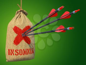 Insomnia - Three Arrows Hit in Red Mark Target on a Hanging Sack on Grey Background.