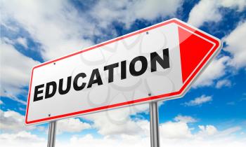 Education - Inscription on Red Road Sign on Sky Background.