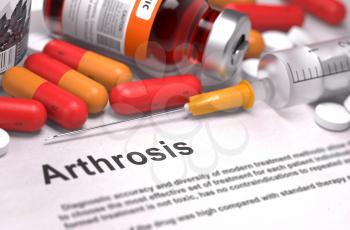 Arthrosis - Printed Diagnosis with Blurred Text. On Background of Medicaments Composition - Red Pills, Injections and Syringe.