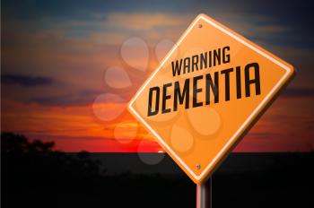 Dementia on Warning Road Sign on Sunset Sky Background.