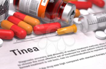 Tinea - Printed Diagnosis with Blurred Text. On Background of Medicaments Composition - Red Pills, Injections and Syringe.