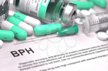 BPH - Benign Prostatic Hyperplasia - Printed Diagnosis with Mint Green Pills, Injections and Syringe. Medical Concept with Selective Focus.