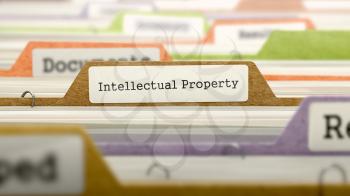 Intellectual Property - Folder Register Name in Directory. Colored, Blurred Image. Closeup View.