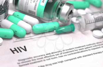 HIV - Human Immunodeficiency Virus - Printed Diagnosis with Blurred Text. On Background of Medicaments Composition - Mint Green Pills, Injections and Syringe.