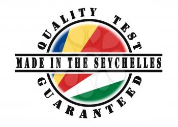 Quality test guaranteed stamp with a national flag inside, Seychelles