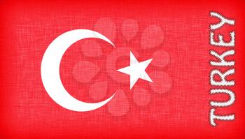 Flag of Turkey with letters stiched on it