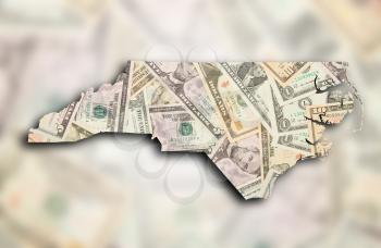 Map of North Carolina, filled with US dollars