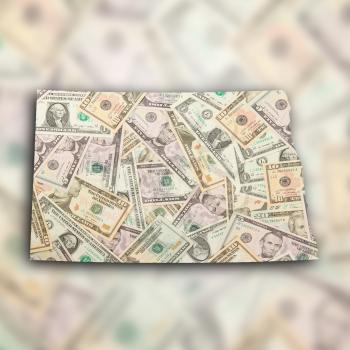 Map of North Dakota, filled with US dollars