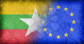 Myanmar and the EU, flags painted on cracked concrete