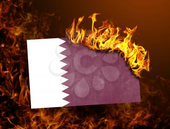 Flag burning - concept of war or crisis - Qatar