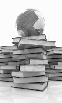 Colorful books and earth on a white background