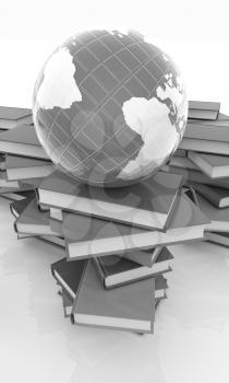 Colorful books and earth on a white background