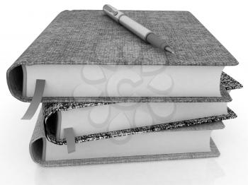 pen on notepad stack on a white background