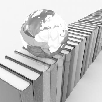 Colorful books and earth on a white background