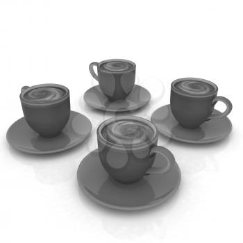 Coffee cups on saucer on a white background