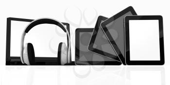 headphones on the  laptop and  tablet pc on a white background