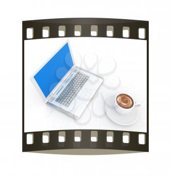 3d cup and a laptop on a white background. The film strip