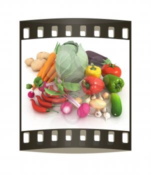 fresh vegetables with green leaves on a white background. The film strip