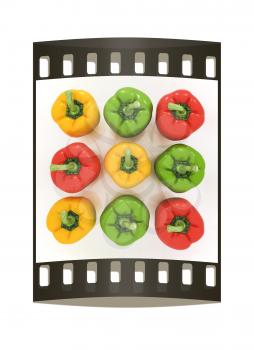 Bell peppers (bulgarian pepper) on a white background. The film strip