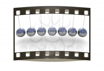 Newton's balls on white background. The film strip