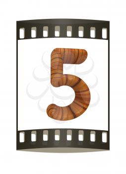 Wooden number 5- five on a white background. The film strip