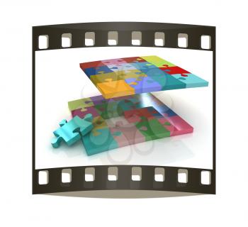 Many-colored puzzle pattern (removable pieces). The film strip