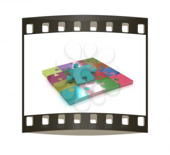 Many-colored puzzle pattern (removable pieces). The film strip