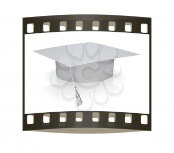 White graduation hat on a white background. The film strip