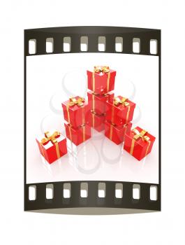 Bright christmas gifts on a white background. The film strip